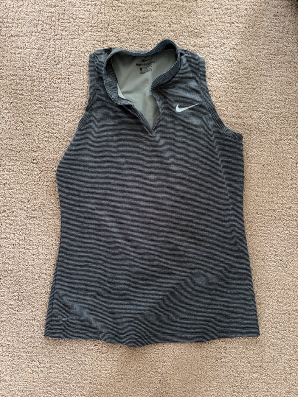 Nike Women’s Sleeveless Training Tank in Charcoal with White Swoosh